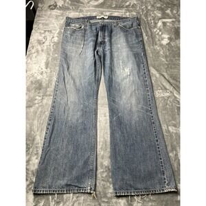 Levi's Jeans Women Size 42x30 Low Boot Cut 527 Light Wash Distressed Blue
